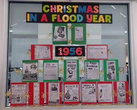 Christmas-in-a-flood-year-1956-front-window.jpg